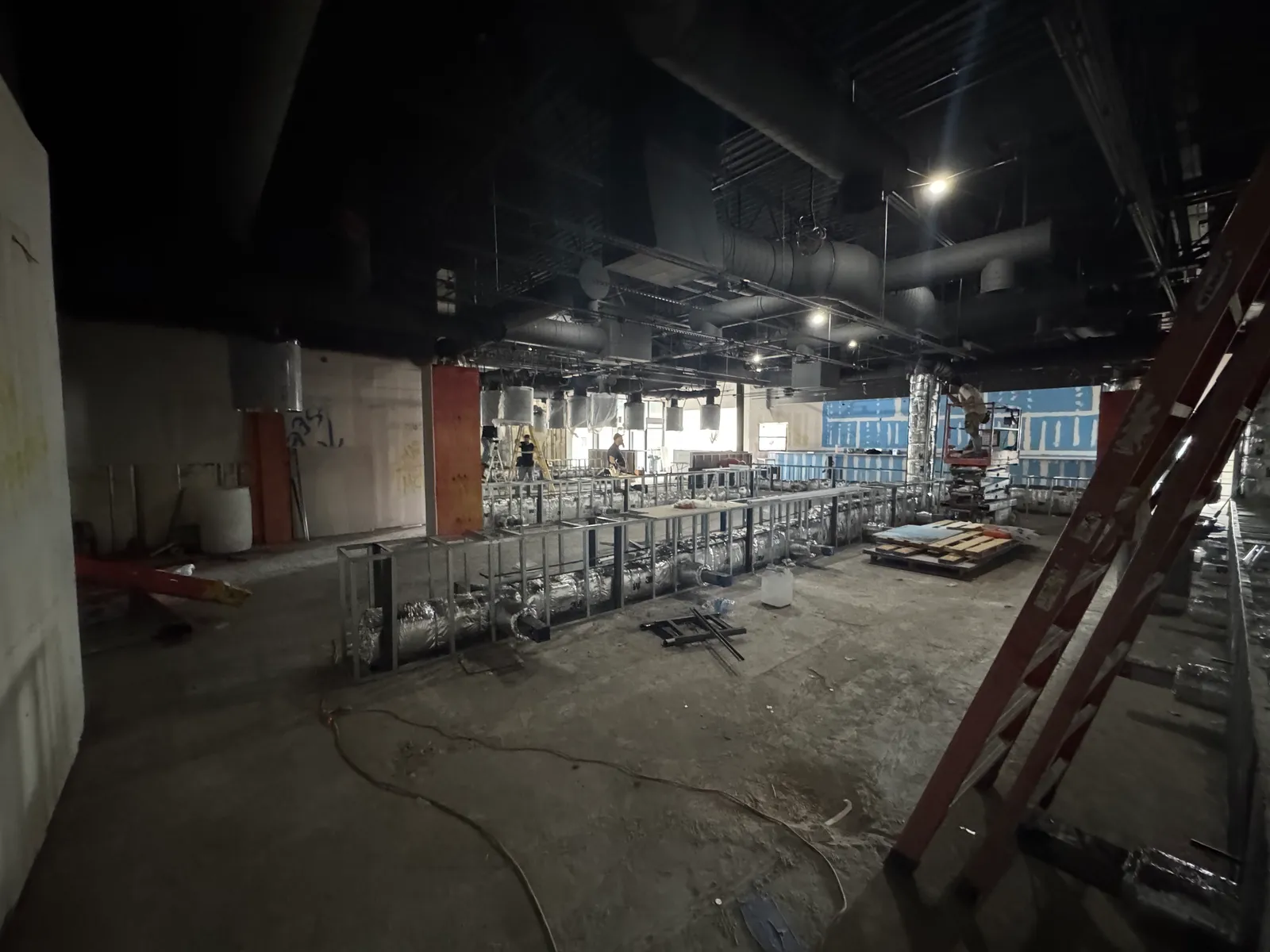 Kauboi BBQ buildout in progress in Plano, Texas — structural framing and MEP rough-in